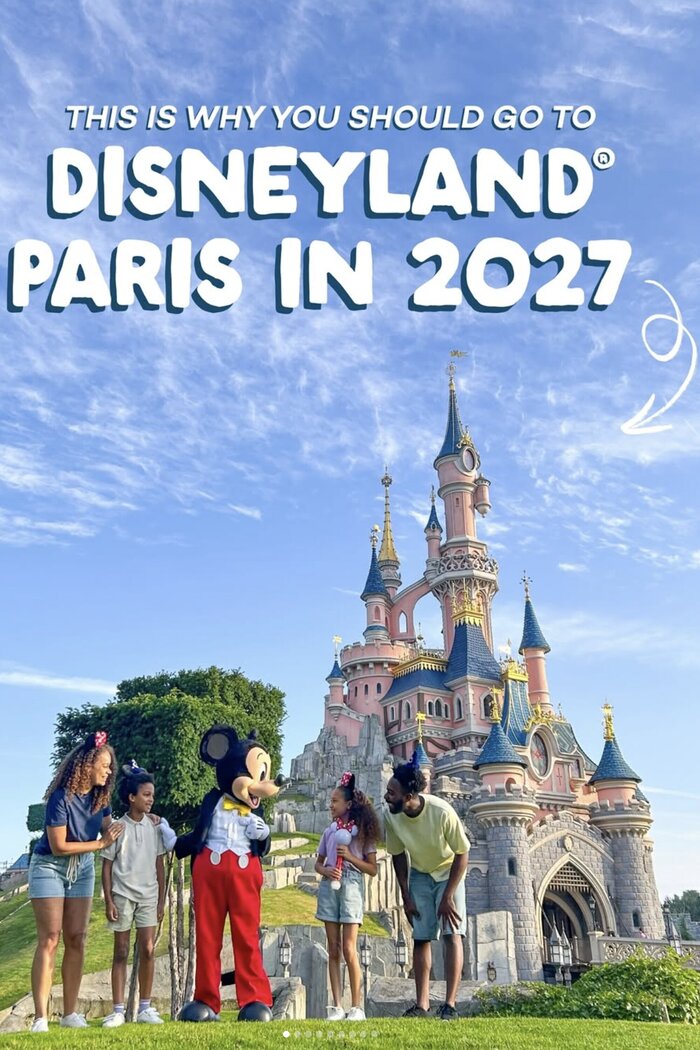 Model family in front of Disneyland castle