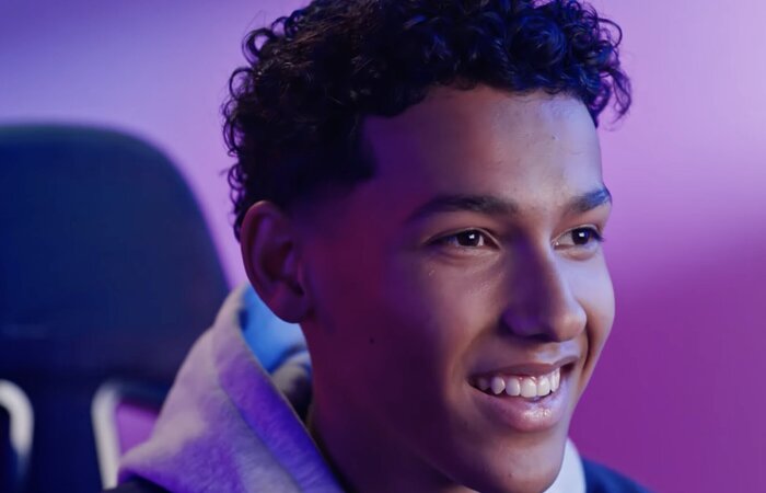 Junior model smiling and gaming