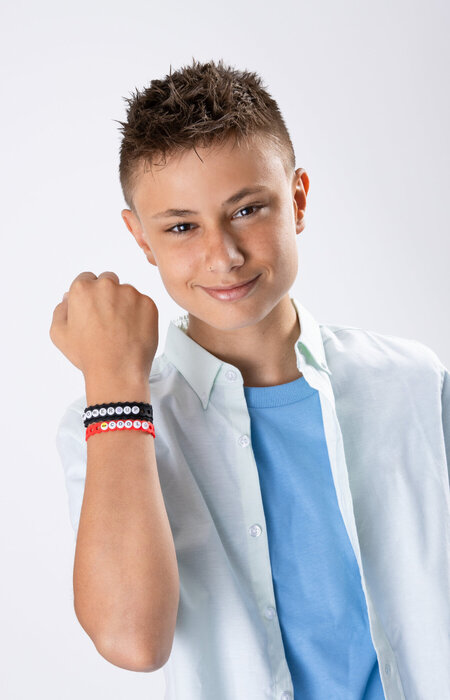 Junior model showing jellybands on wrist