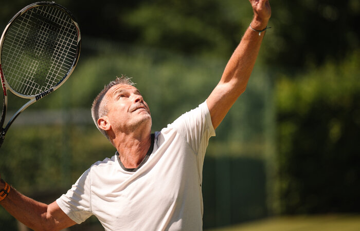 Classic model playing tennis