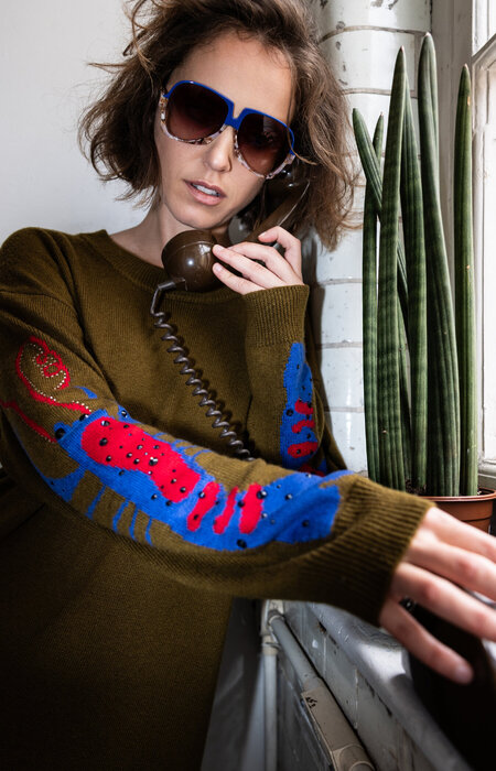 Model in glasses on phone