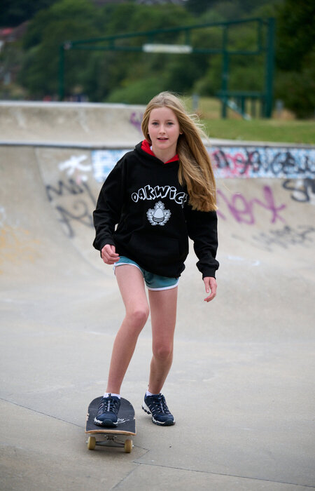Junior model on skateboard