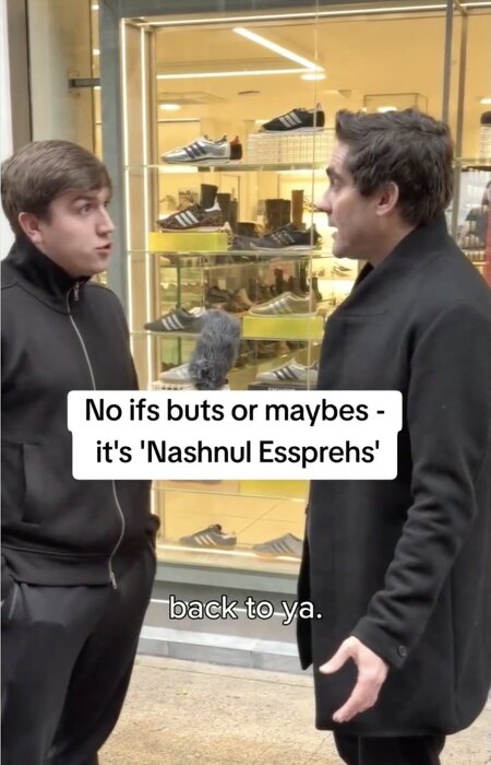 Man conducting street interview with on screen captions