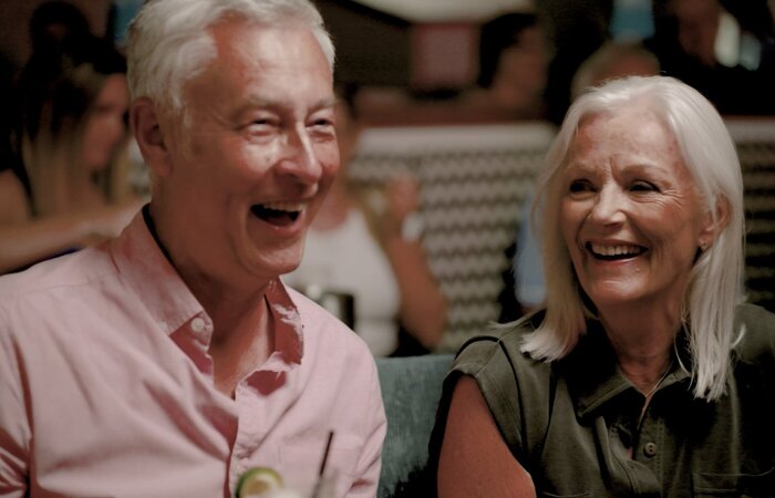 Classic model couple laughing together
