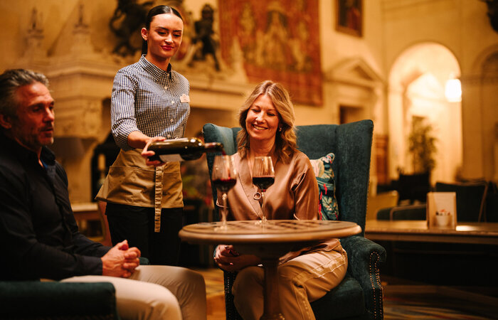 Serving wine to the models