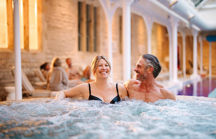 Model couple in the jacuzzi