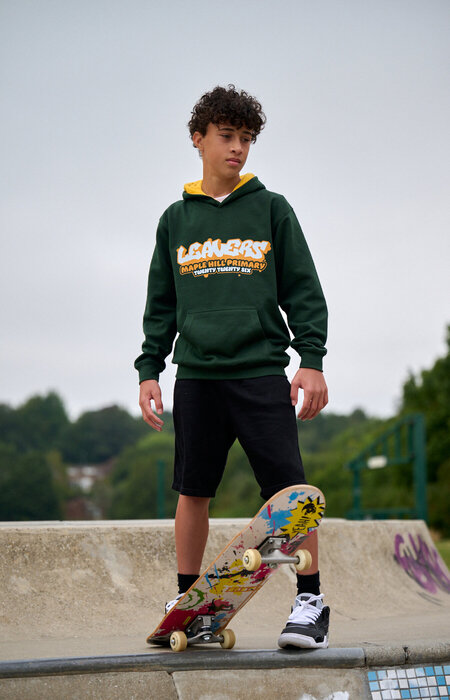 Junior model with skateboard