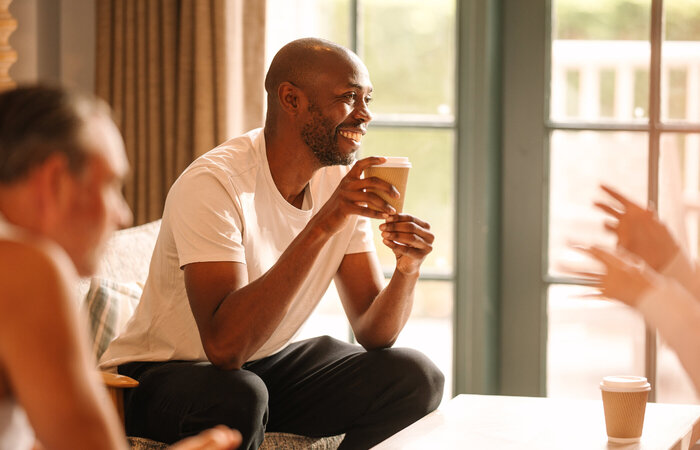 Classic model enjoying drink after spa