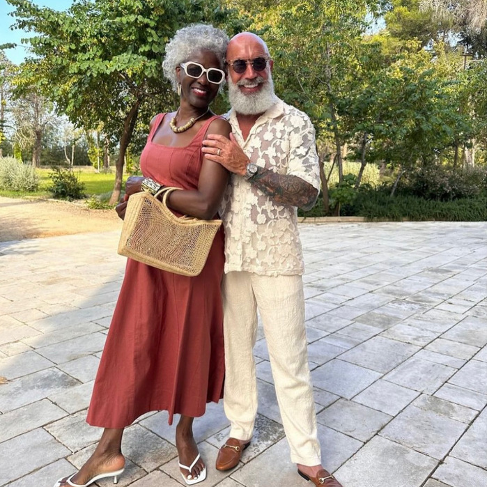 Classic model couple on holiday smiling
