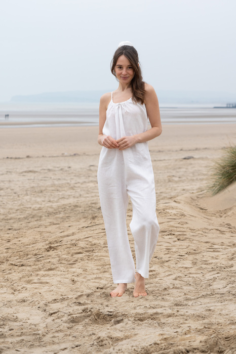 Model in white on beach