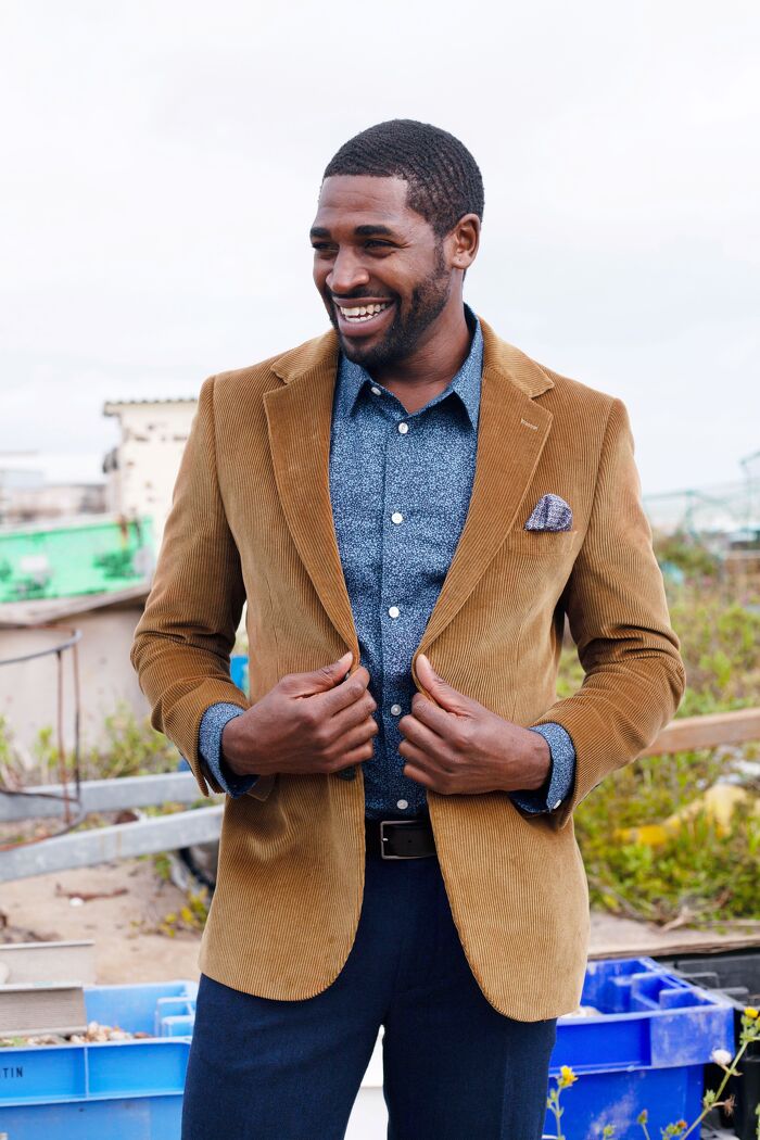Male model smiling in formal jacket