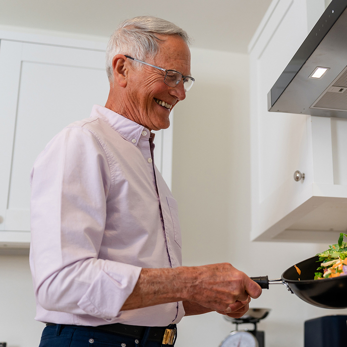Classic male model cooking