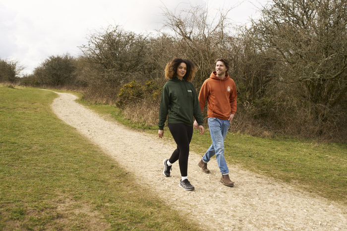 Two models walking in the country together