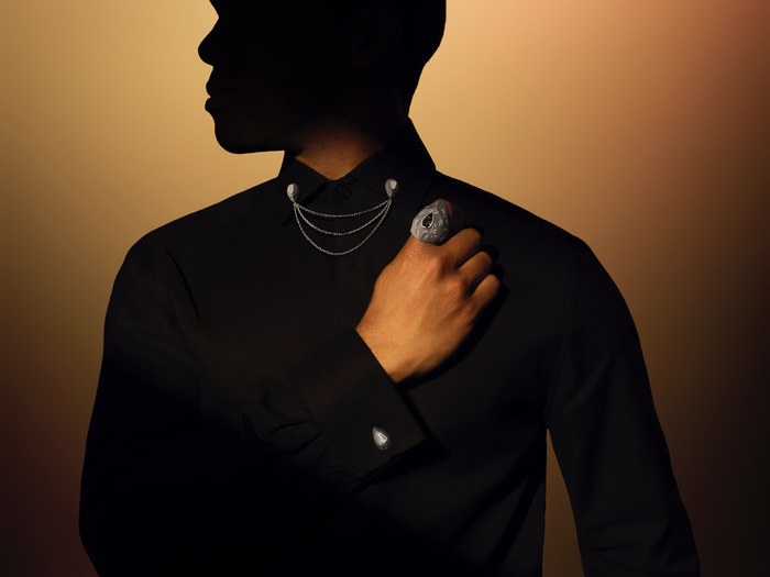Male hand model displaying diamond fine jewellery