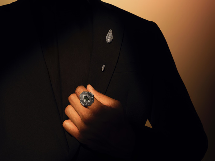 Male hand model displaying diamond fine jewellery