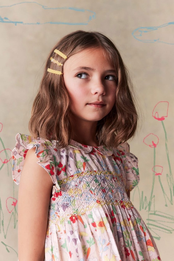 Junior model shoulder length brown hair with clips