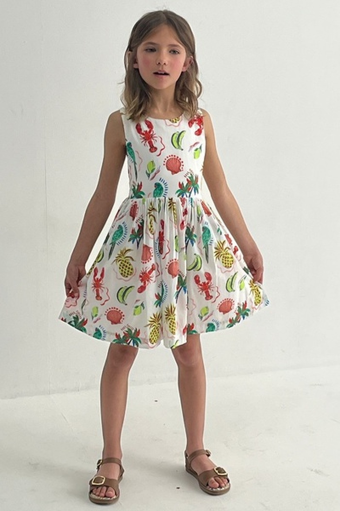 Junior model in patterned dress