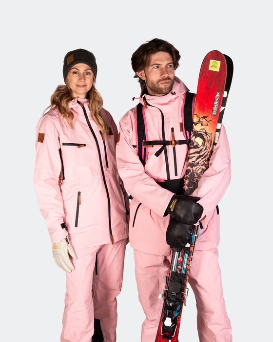 Male and female models in pink ski wear
