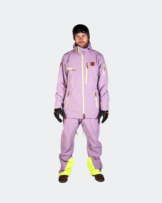 Male model standing in lilac skiwear