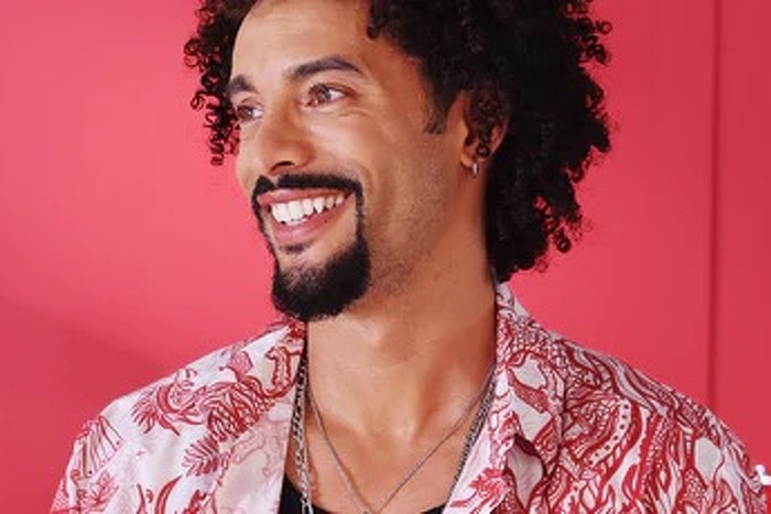 male model with beard smiling