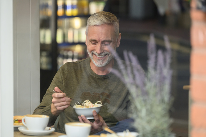 Classic male model drinking tea