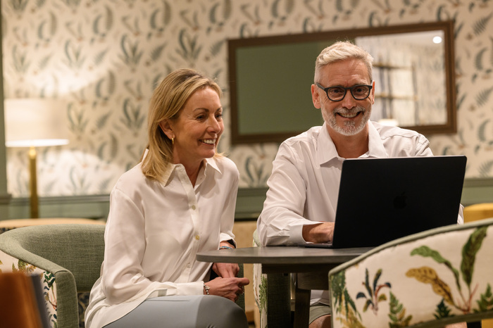 Couple looking at laptop together