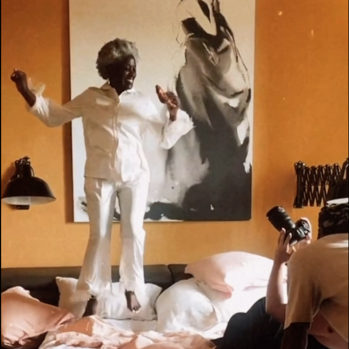 Classic model jumping on the bed
