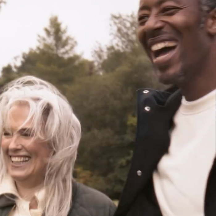 Two models laughing